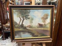 Landscape with houses by the river