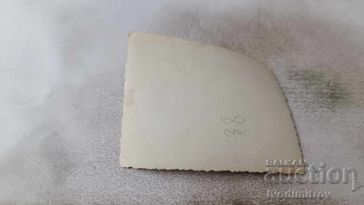 Photo of four young people in retro swimsuits in the sea with price 2.45 BGN | € 1.25