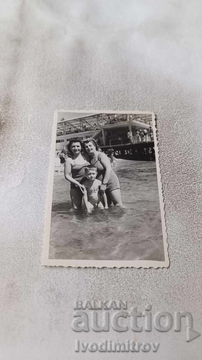 Photo of Two Women and a Little Boy in the Sea Photo of Two Women and a Little Boy in the Sea