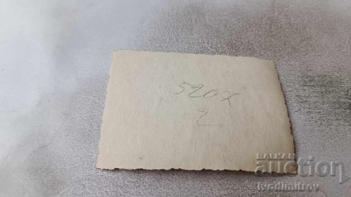 Photo Sofia Man and woman with bouquet in front of the Adjacent Palace with price 1.65 BGN | € 0.84 Photo Sofia Man and woman with bouquet in front of the Adjacent Palace with price 1.65 BGN | € 0.84