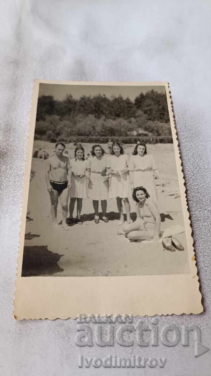 Photo: Man and Young Girls on the Beach Photo: Man and Young Girls on the Beach