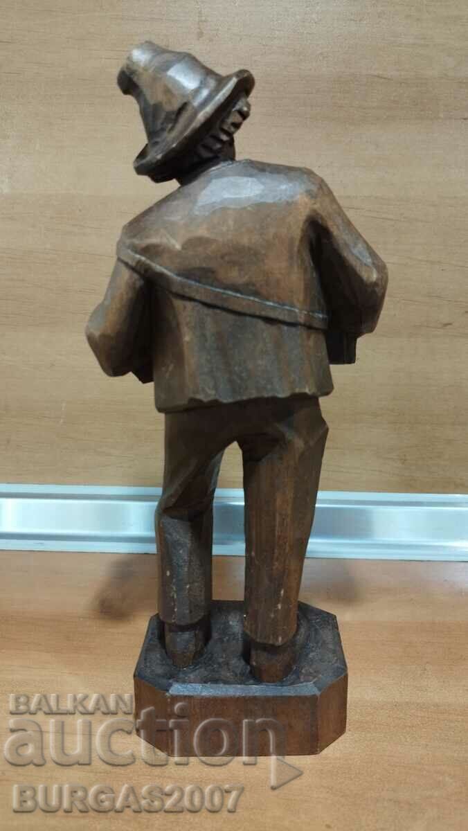 Delivery of Old wooden figure, musician with accordion, 29 cm.