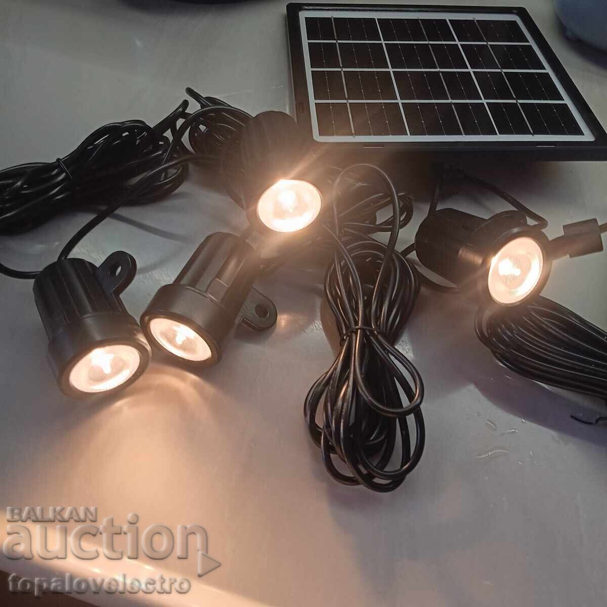Delivery of Set of 4 solar garden spotlights