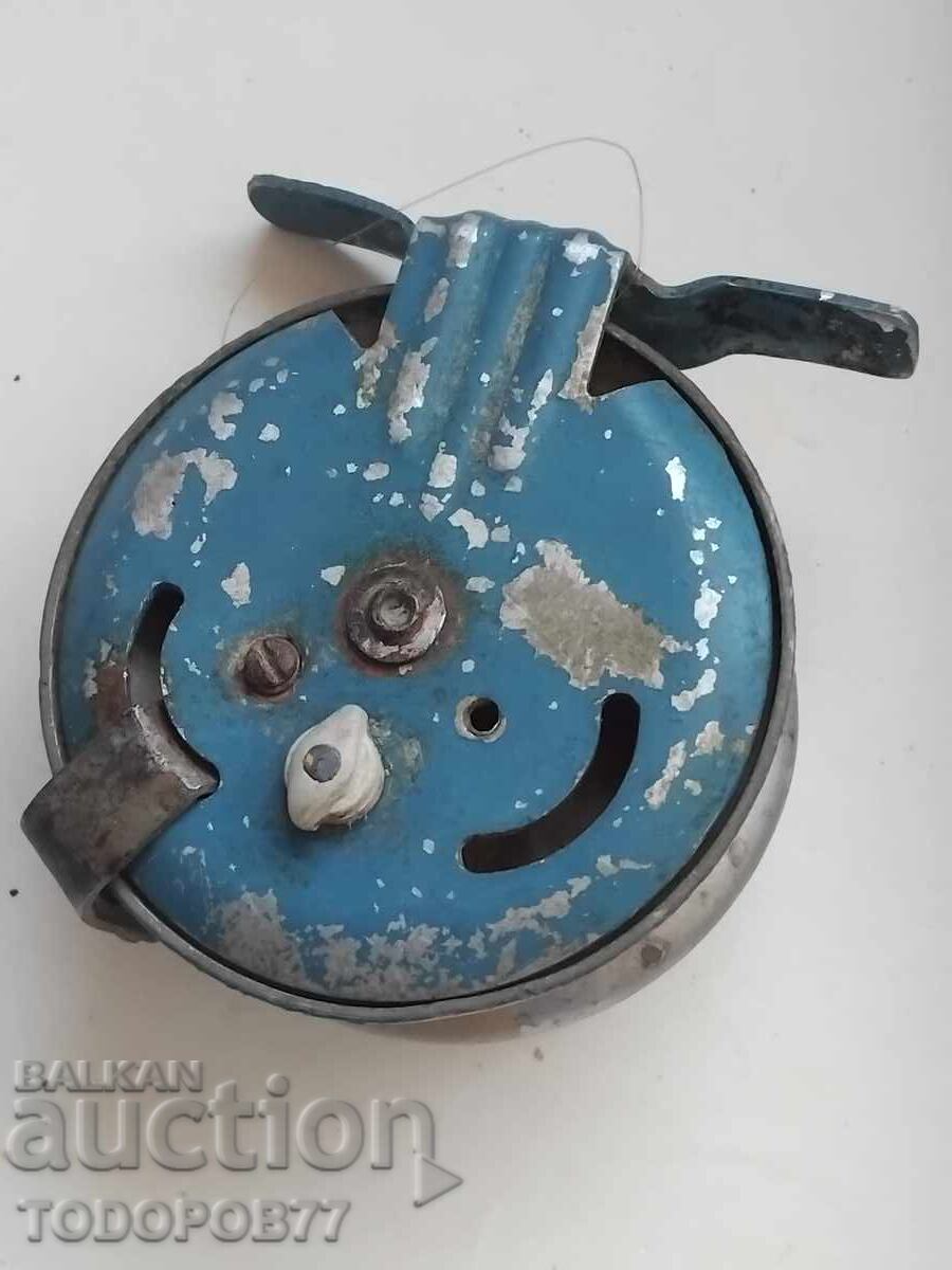 Old fishing reel Old fishing reel