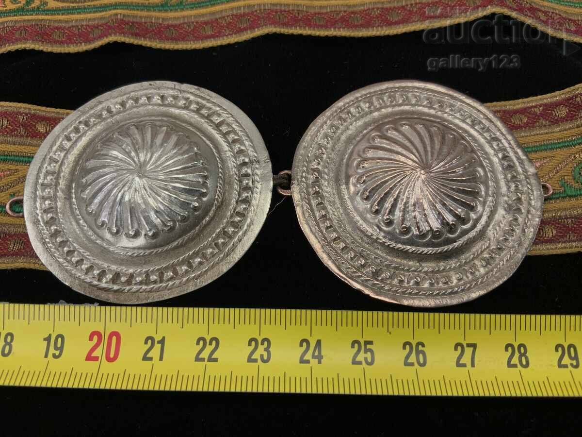 Auction Revival-era silver paftas (ornamental belt buckles) and a belt with goldwork embroidery and textile Auction Revival-era silver paftas (ornamental belt buckles) and a belt with goldwork embroidery and textile