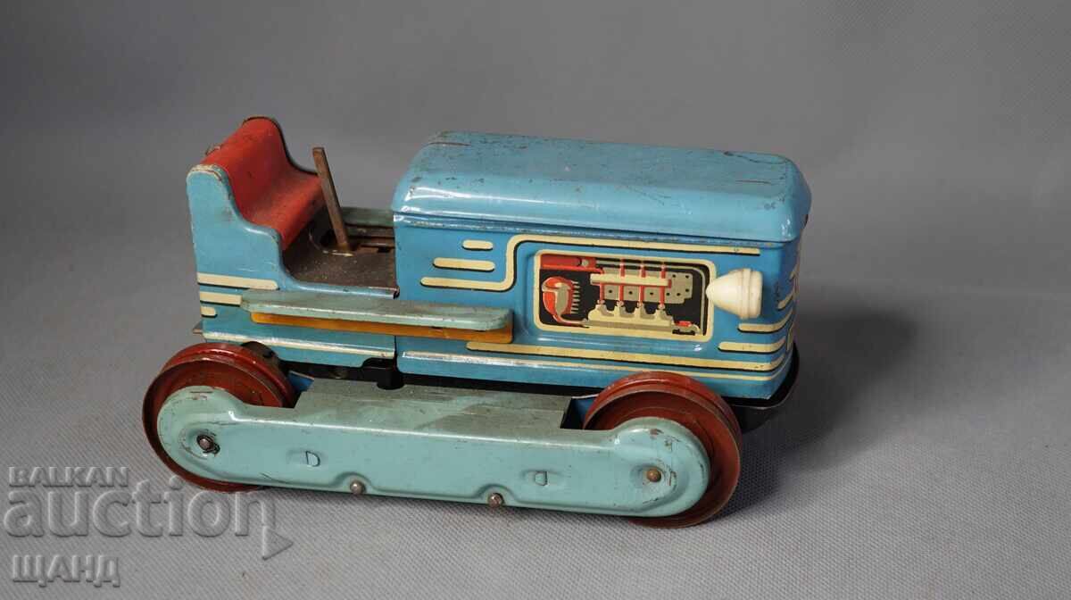 Jucărie metalică veche model tractor pe baterii