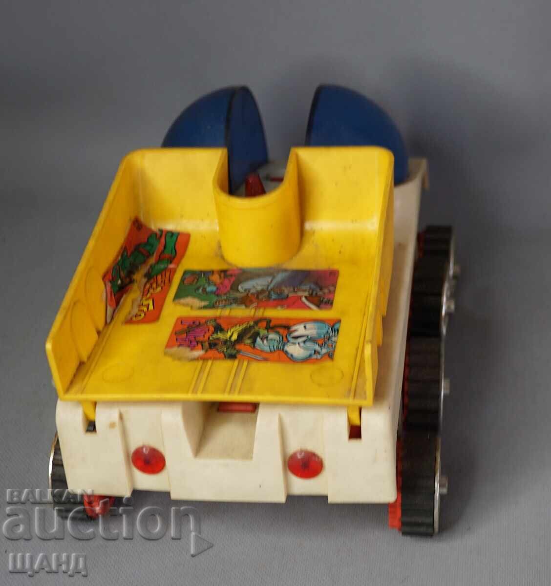 Delivery of Old Russian plastic toy model Lunokhod (moon rover) on batteries Delivery of Old Russian plastic toy model Lunokhod (moon rover) on batteries