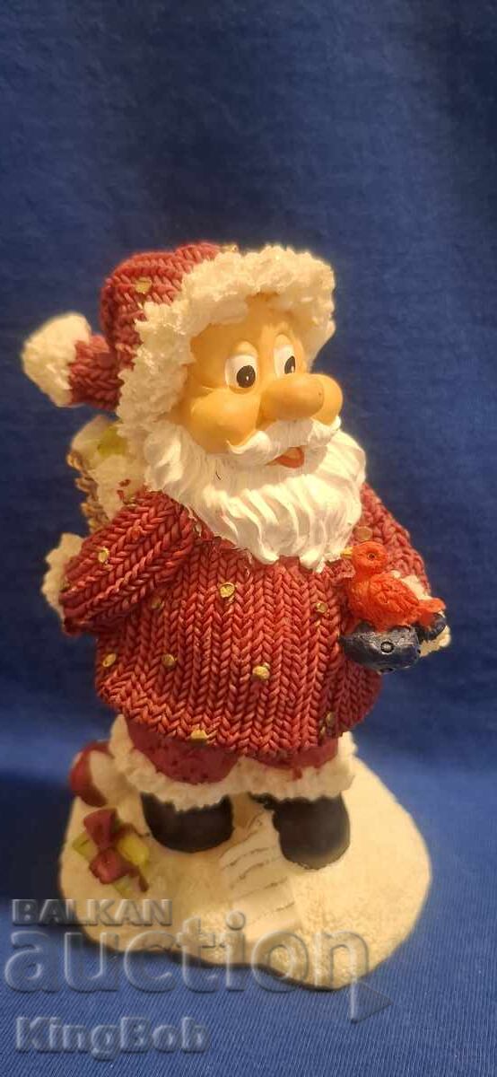 FIGURINĂ ELEGANTA "MOȘ CRĂCIUN ÎN CĂLĂTORIE"