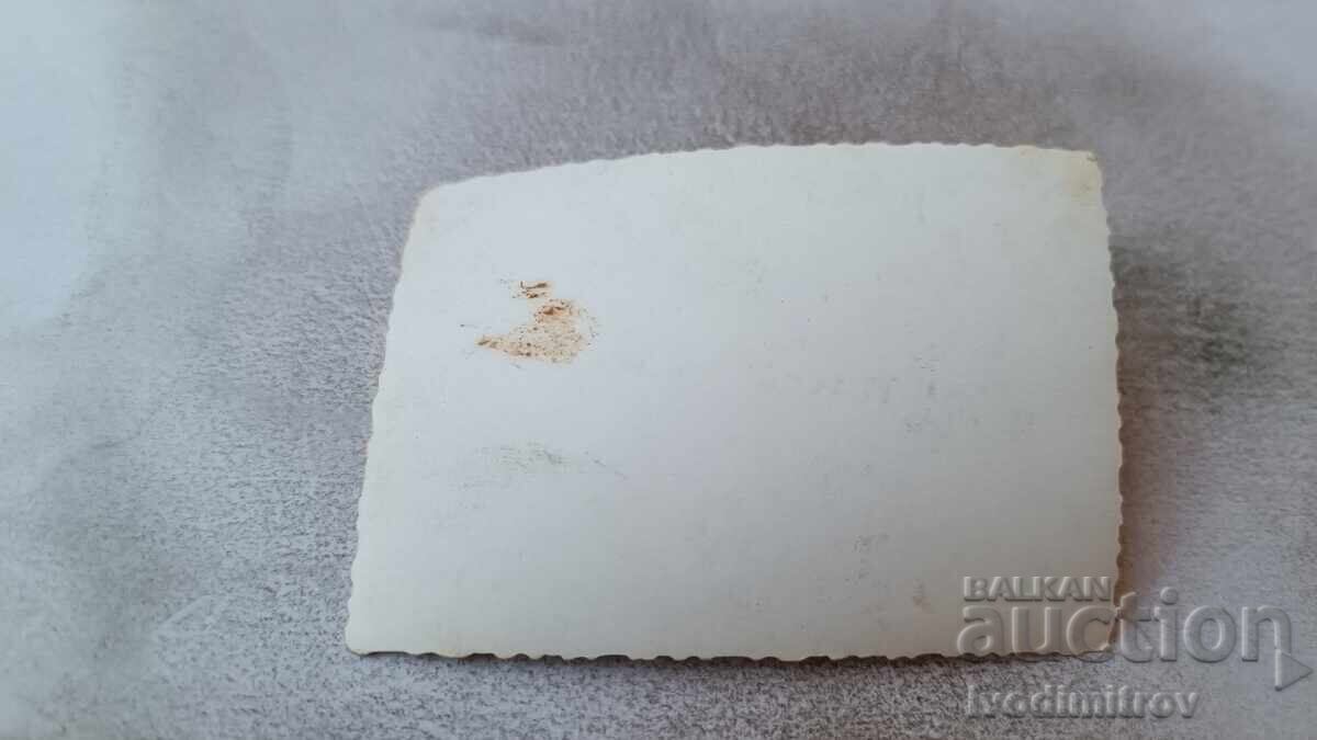 Photo Men in front of a newly built house with price 2.65 BGN | € 1.35