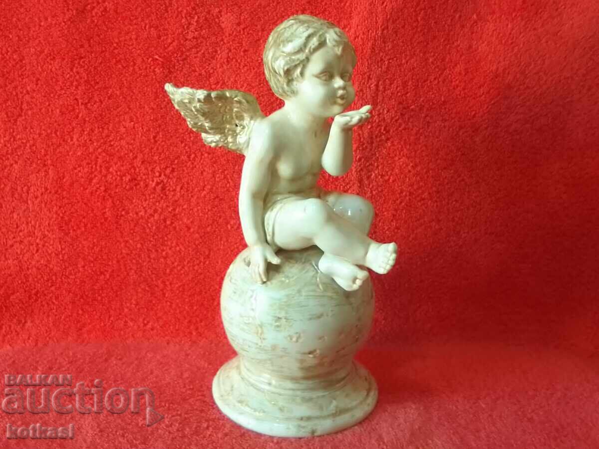 Old porcelain figure of an Angel sitting on a ball with price 165.50 BGN | € 84.62