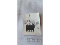 Photograph Haskovo Men and women in front of the monument in winter 1954