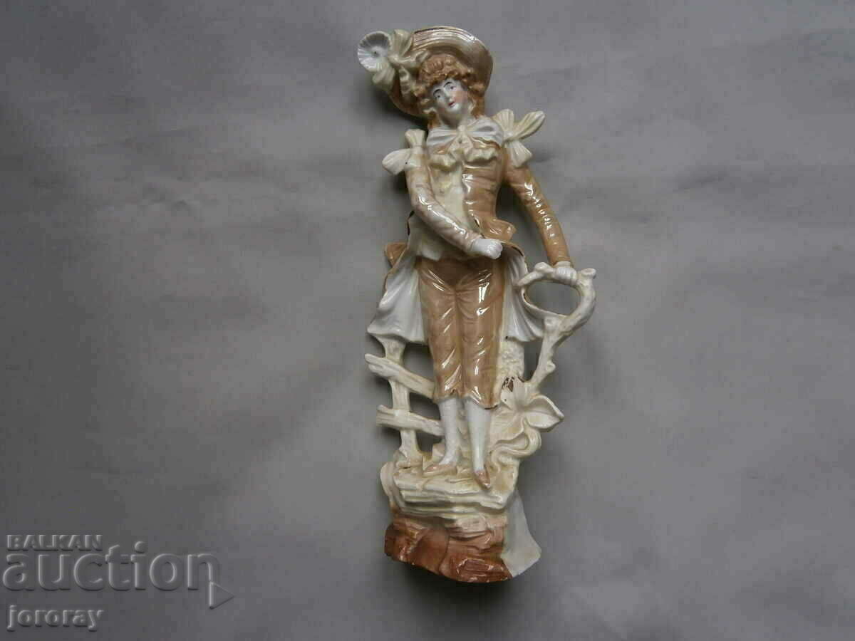 Porcelain figure 23 cm. Porcelain figure 23 cm.