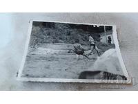 Φωτογραφία Δύο άνδρες στην παραλία