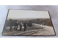 Photo of Five Young Men on the Road