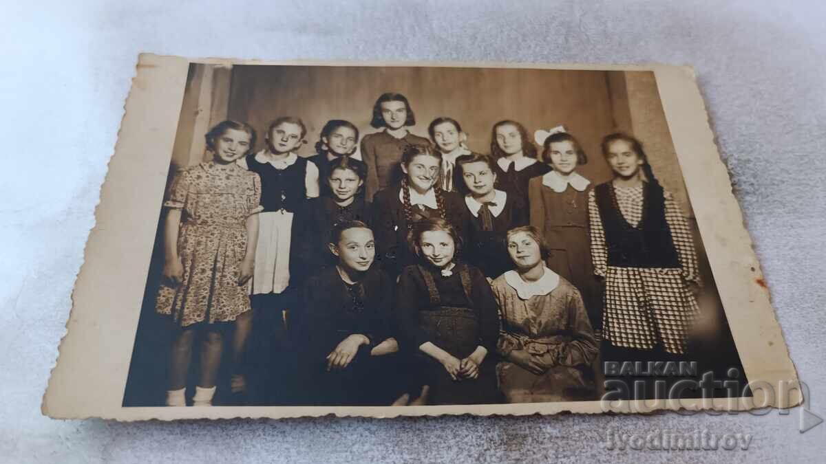 Photo Schoolgirls with their teacher Photo Schoolgirls with their teacher
