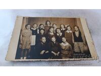 Photo Schoolgirls with their teacher