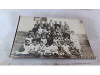 Photo of Students with their Teacher