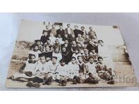 Photo of Students with their Teacher