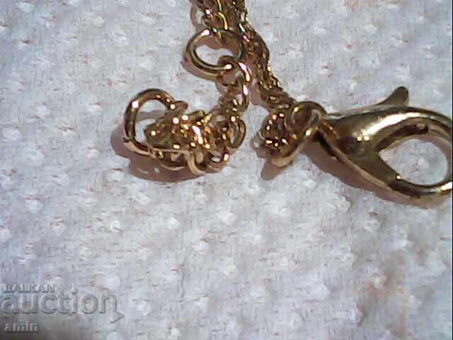 Auction  Beautifully gold-plated, unworn necklace, earthworm