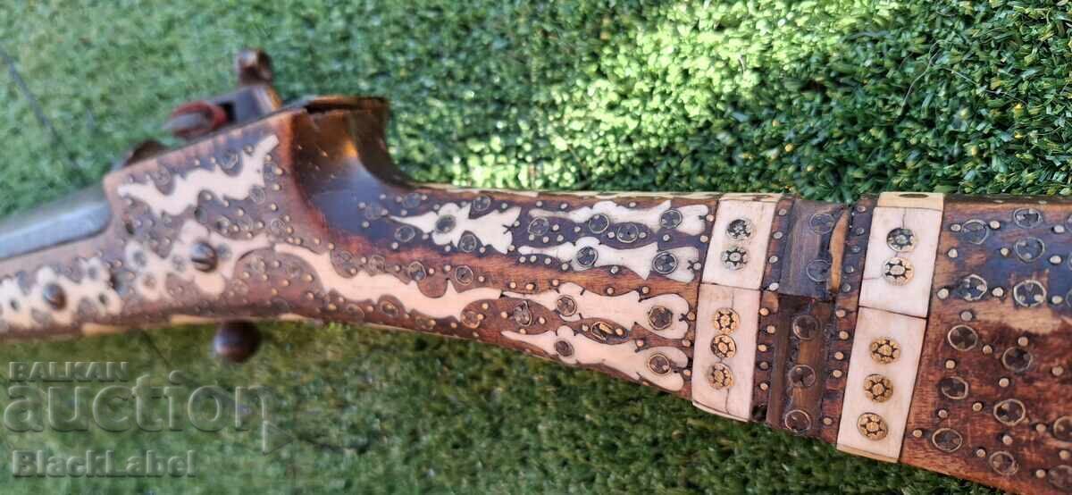 Auction  Flintlock musket, shishane