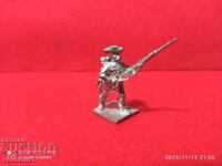 Παλιός κασσιτέρινιος στρατιώτης δεκαετίας '50, άβαφος Kinder, λεπτομερής