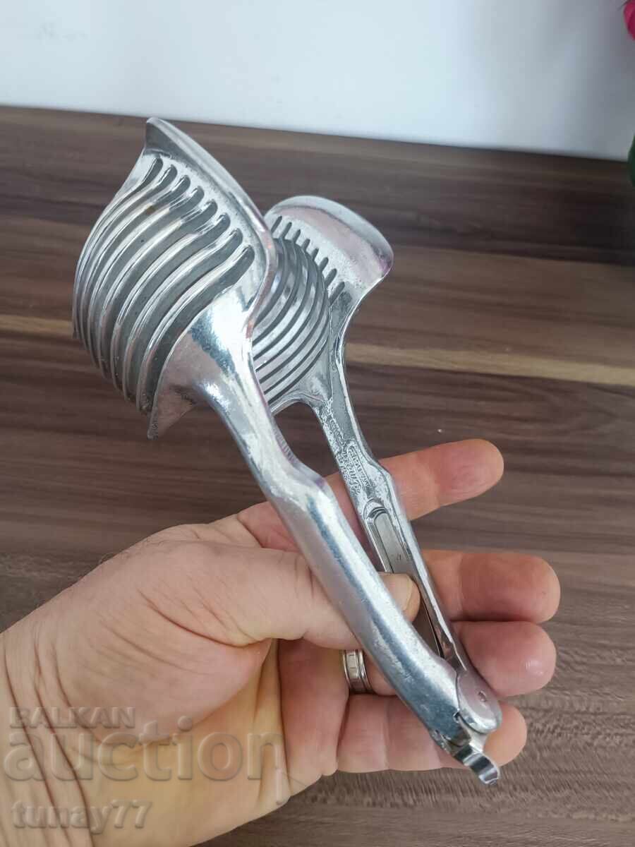 Hand-held stainless steel cutter for fruits and other things