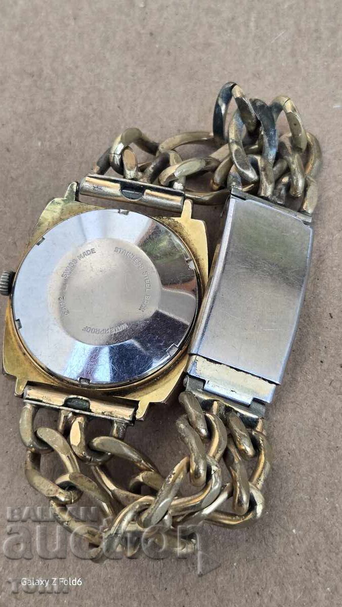 Delivery of DUGENA AUTOMATIC SWISS MADE RARE GOLD PLATED DOESN'T WORK BZC !!