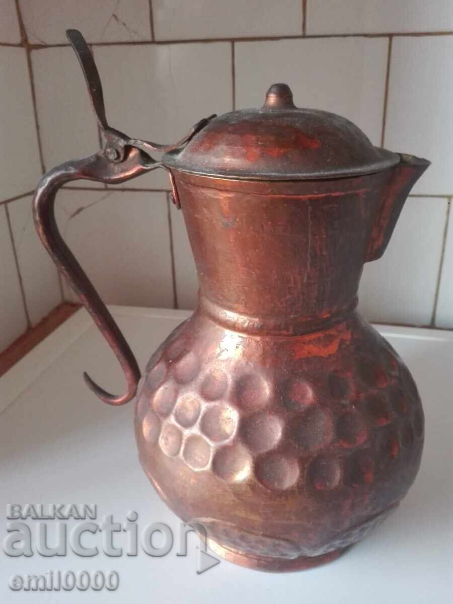 Delivery of Old copper jug.