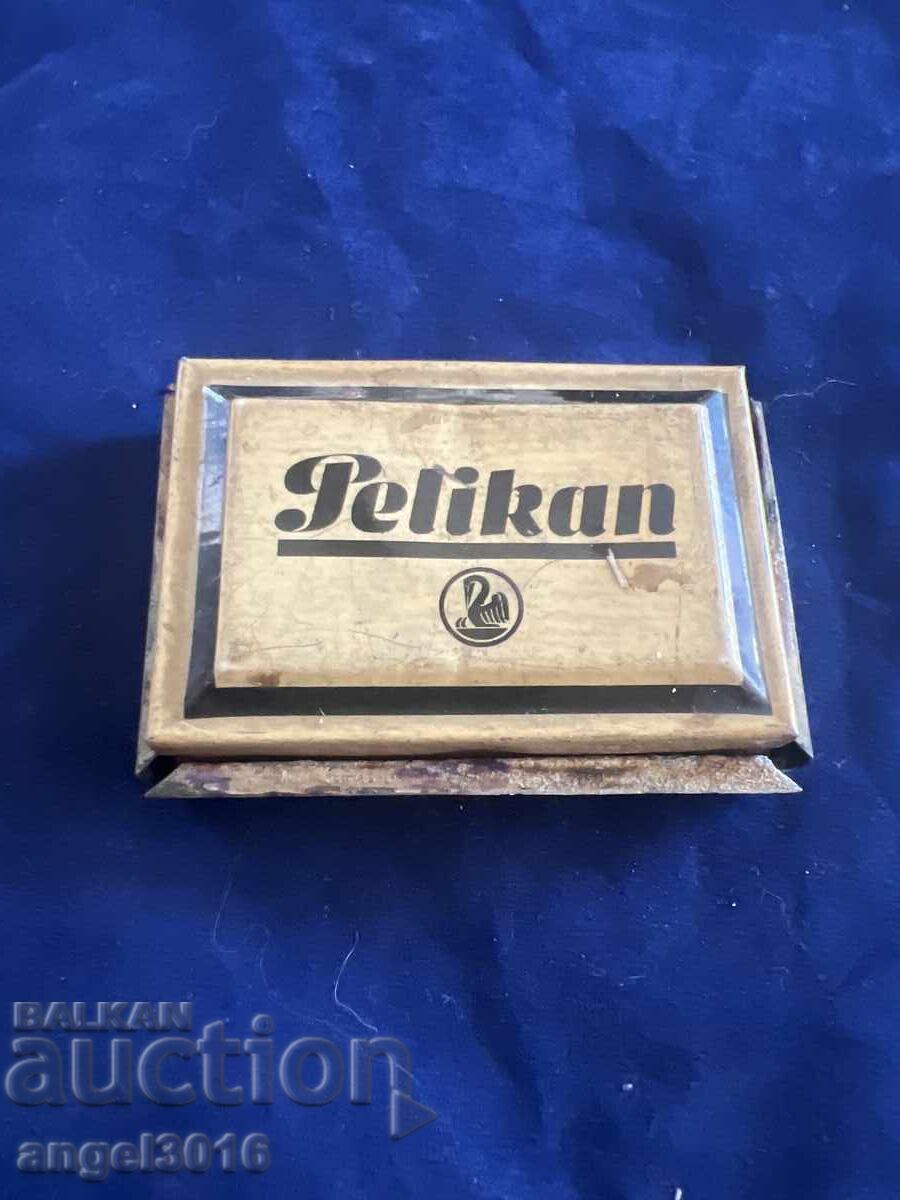 Old vintage Pelikan stamp pad in a metal case