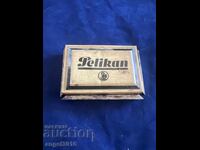 Vechi tampon de ștampilă vintage Pelikan în carcasă metalică