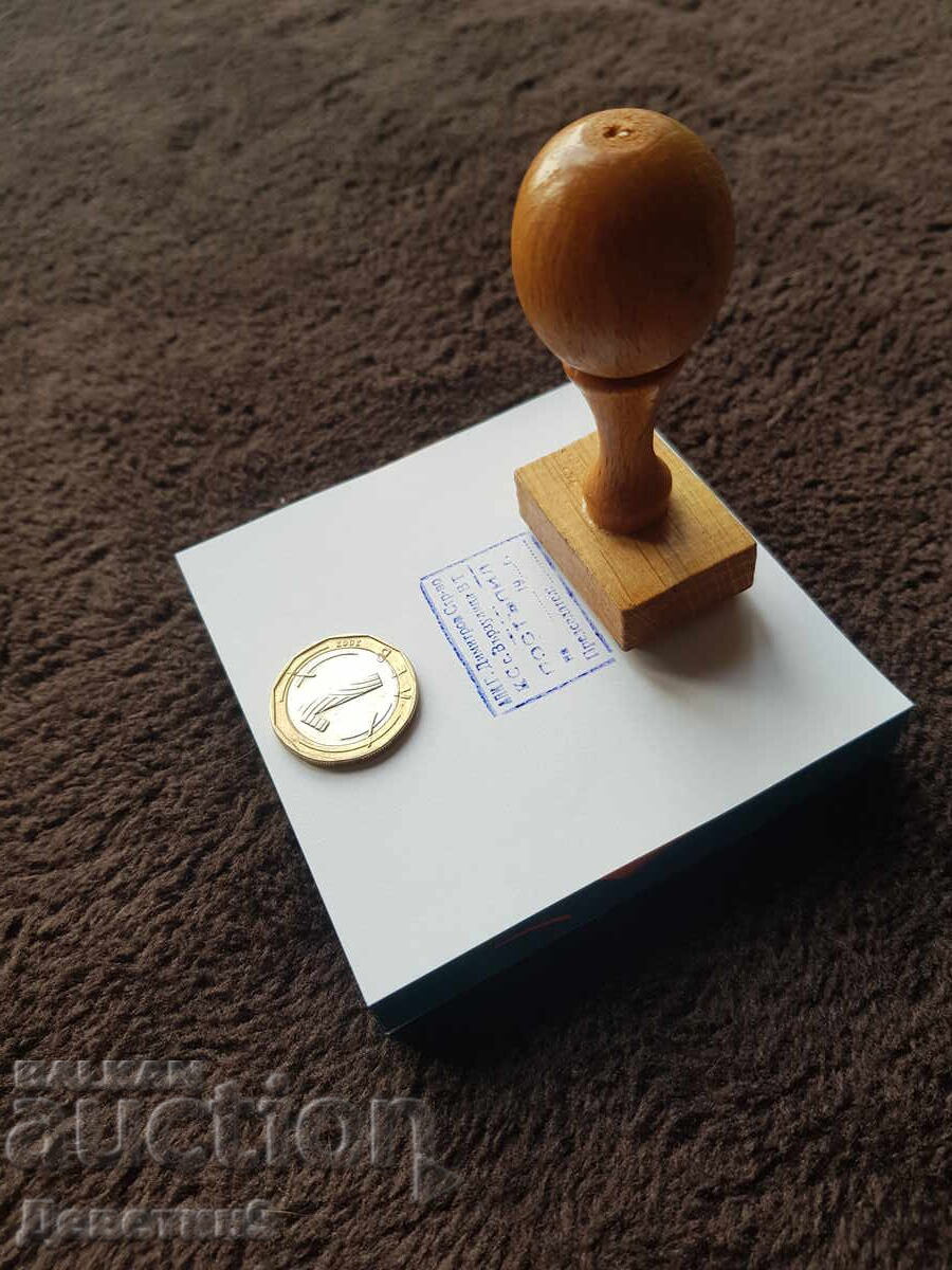 Auction  Old wet stamp with a wooden handle