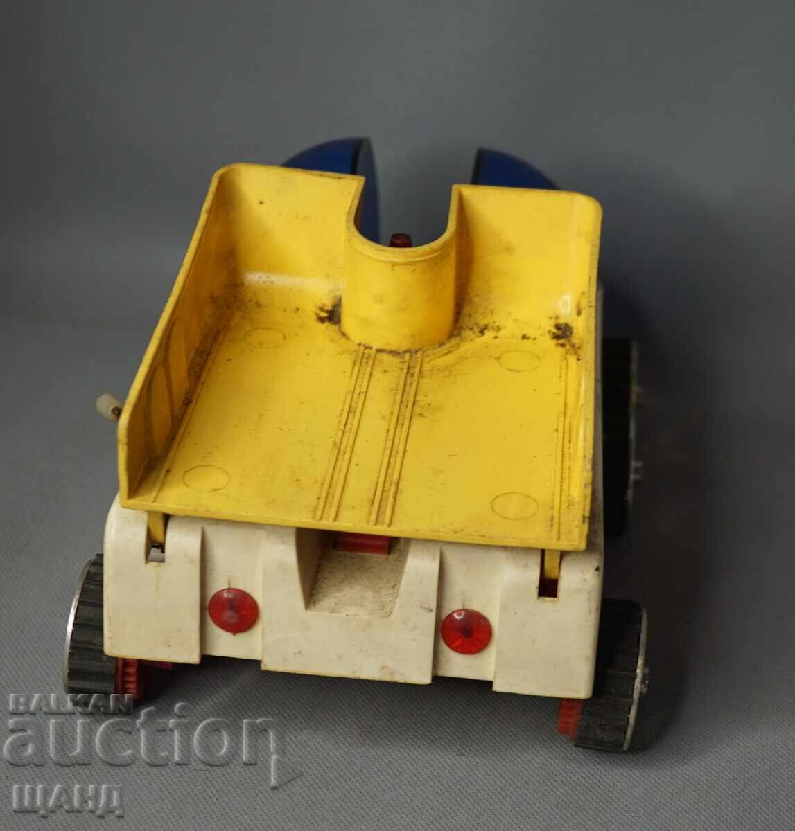 Delivery of Old Russian plastic toy model Lunokhod (moon rover) on batteries