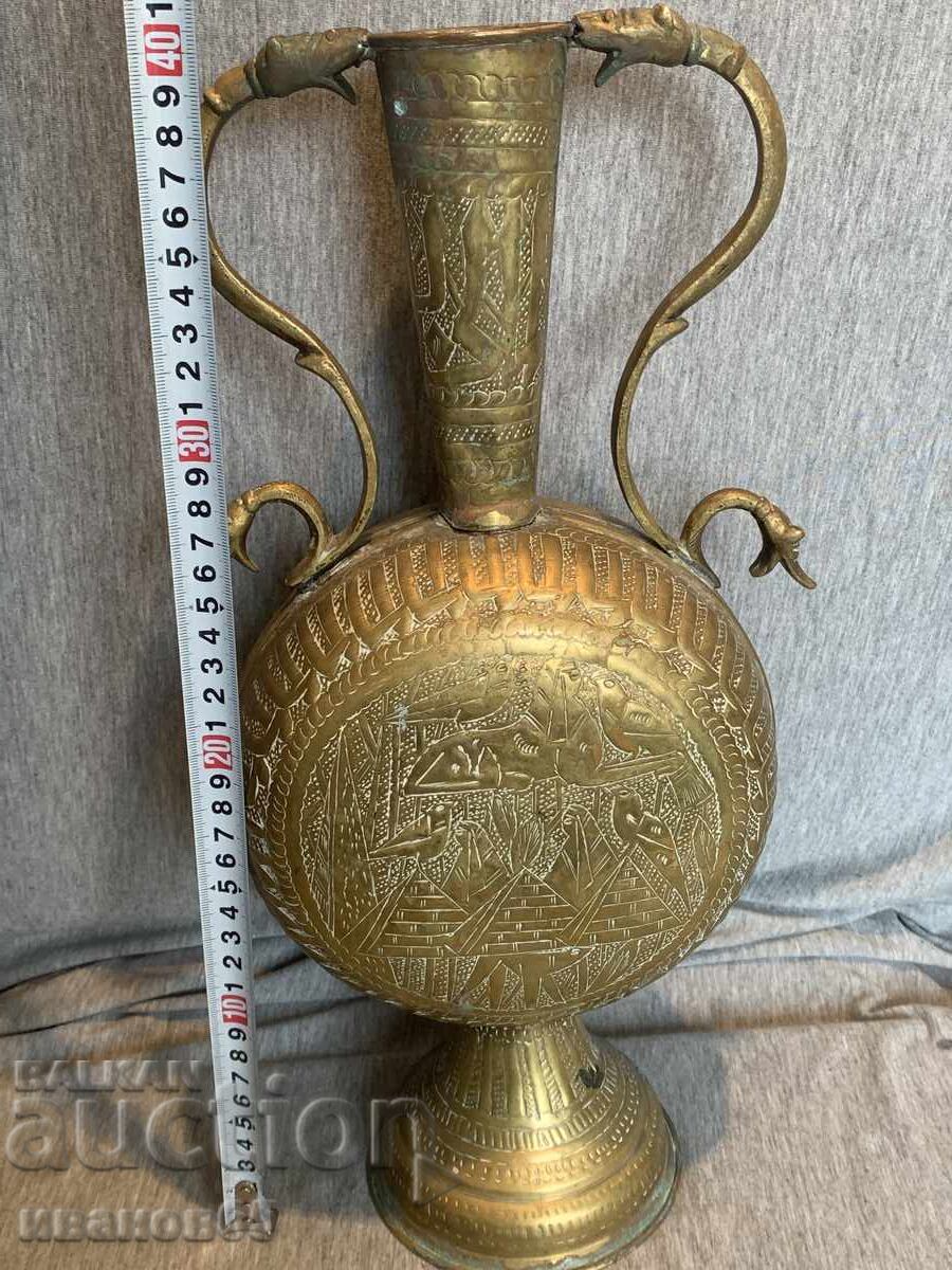 Delivery of Brass pitcher/jug with decorative engravings and shaped handles Delivery of Brass pitcher/jug with decorative engravings and shaped handles