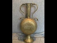 Brass pitcher/jug with decorative engravings and shaped handles