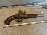 Vintage replica of a flintlock pistol