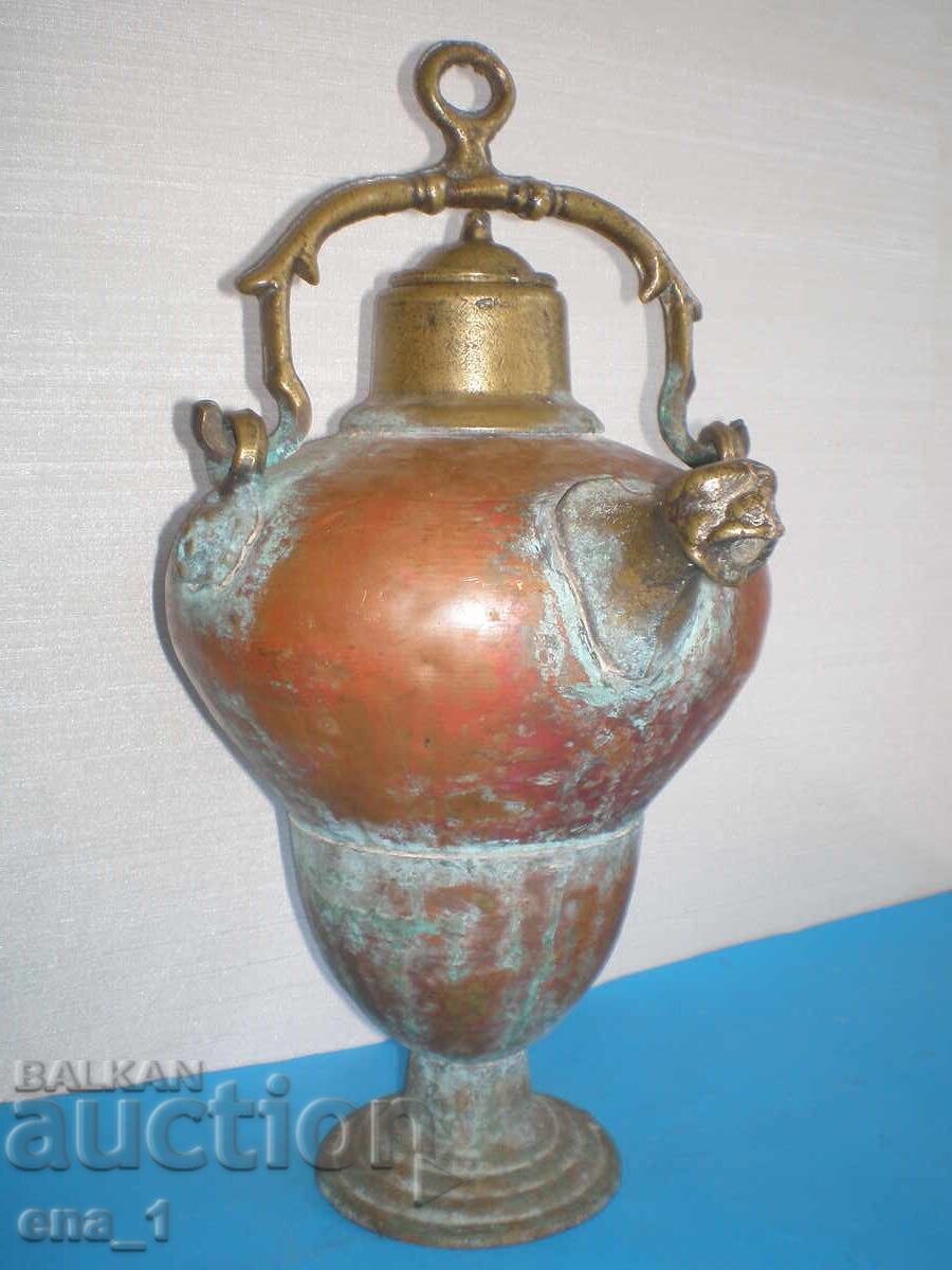 Old ritual European vessel for holy water/Aquamanile