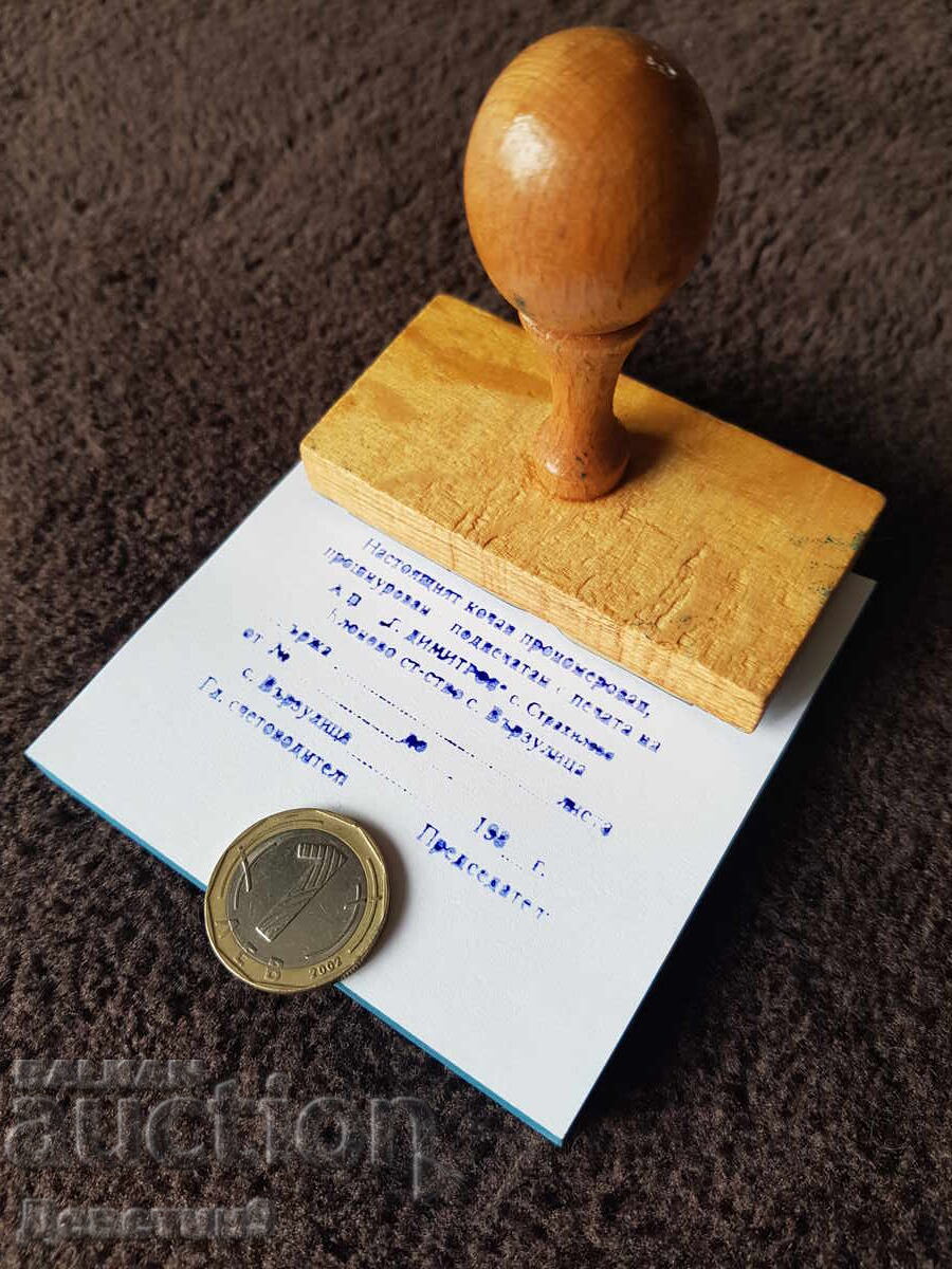 Auction  Old wet stamp with a wooden handle