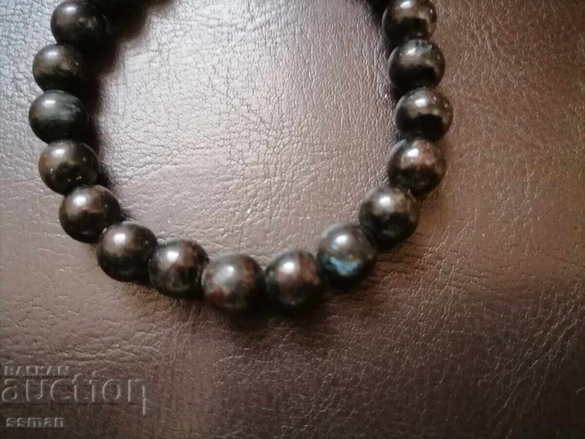 Women's bracelet made of nummite nummite beads, 8 mm each with price 40.01 BGN | € 20.46 Women's bracelet made of nummite nummite beads, 8 mm each with price 40.01 BGN | € 20.46