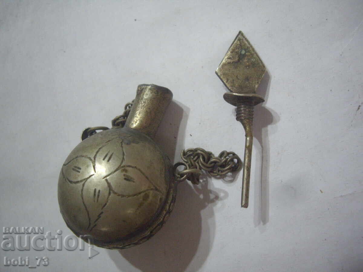 Auction  Old perfume bottle.