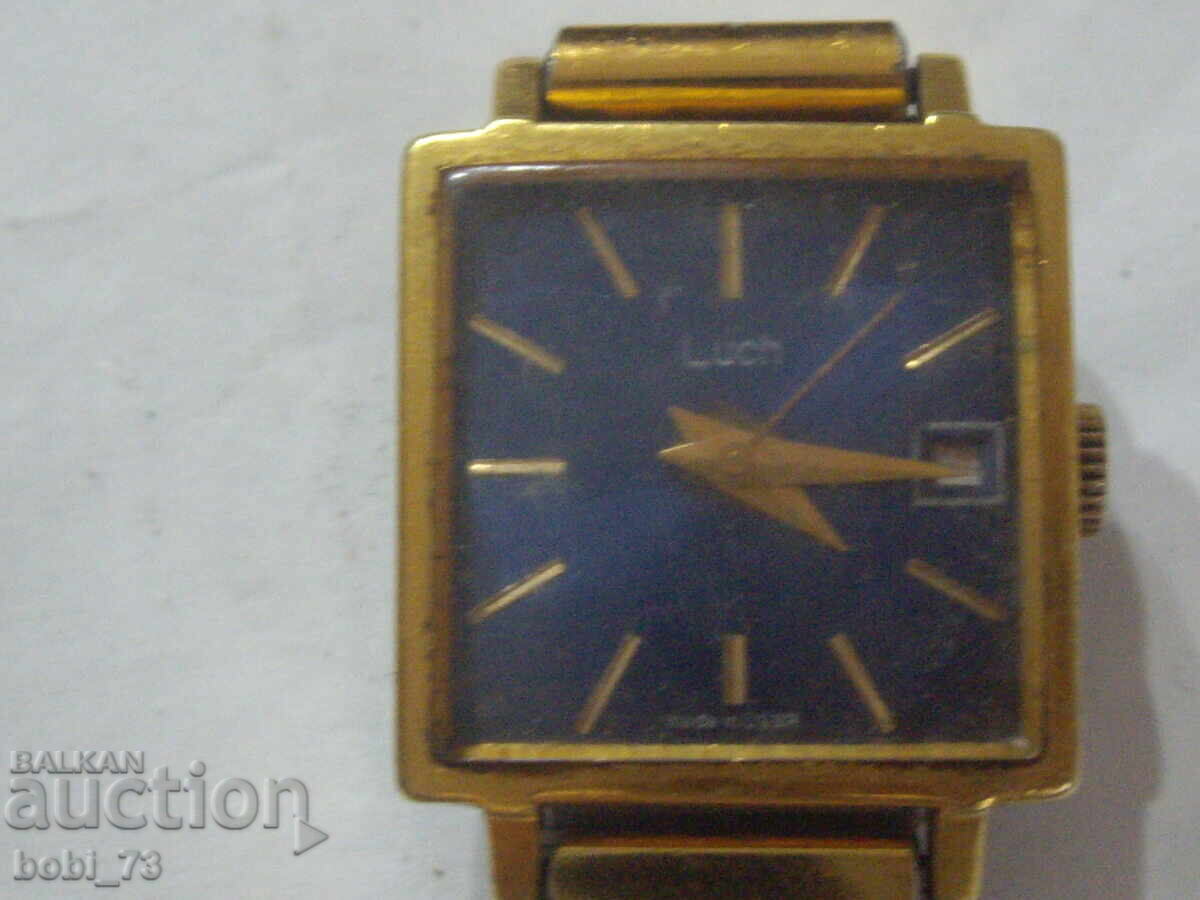 Delivery of Old gold plated ladies watch.