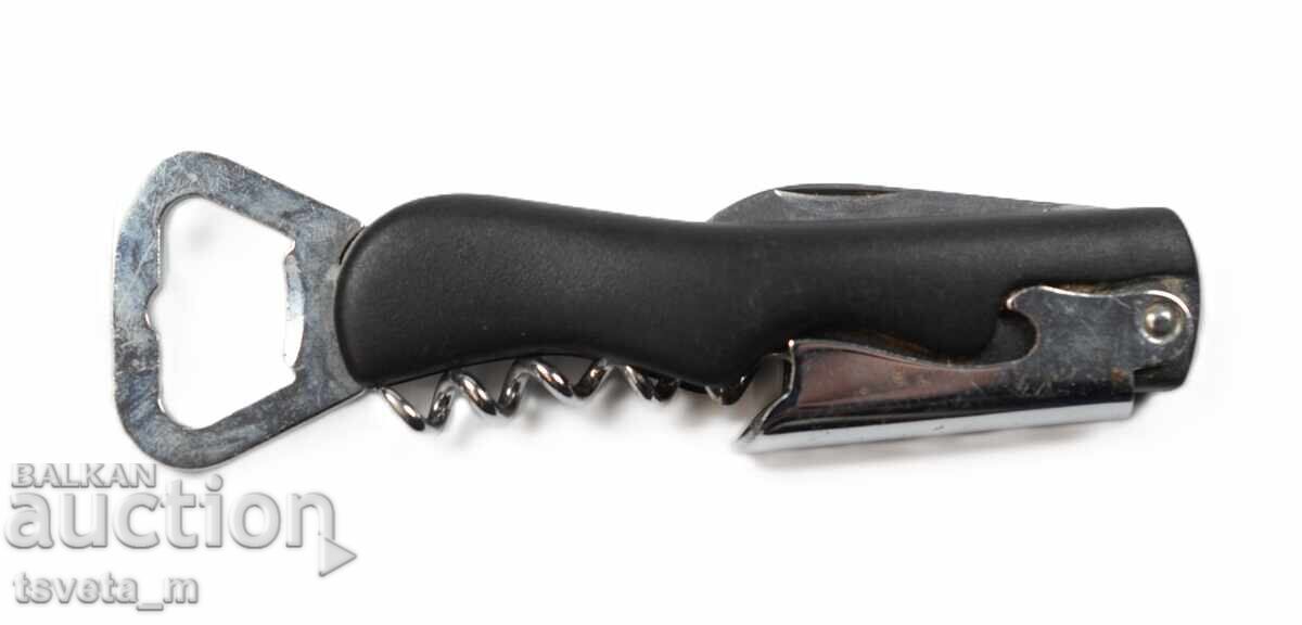 Corkscrew with two bottle openers and a small knife