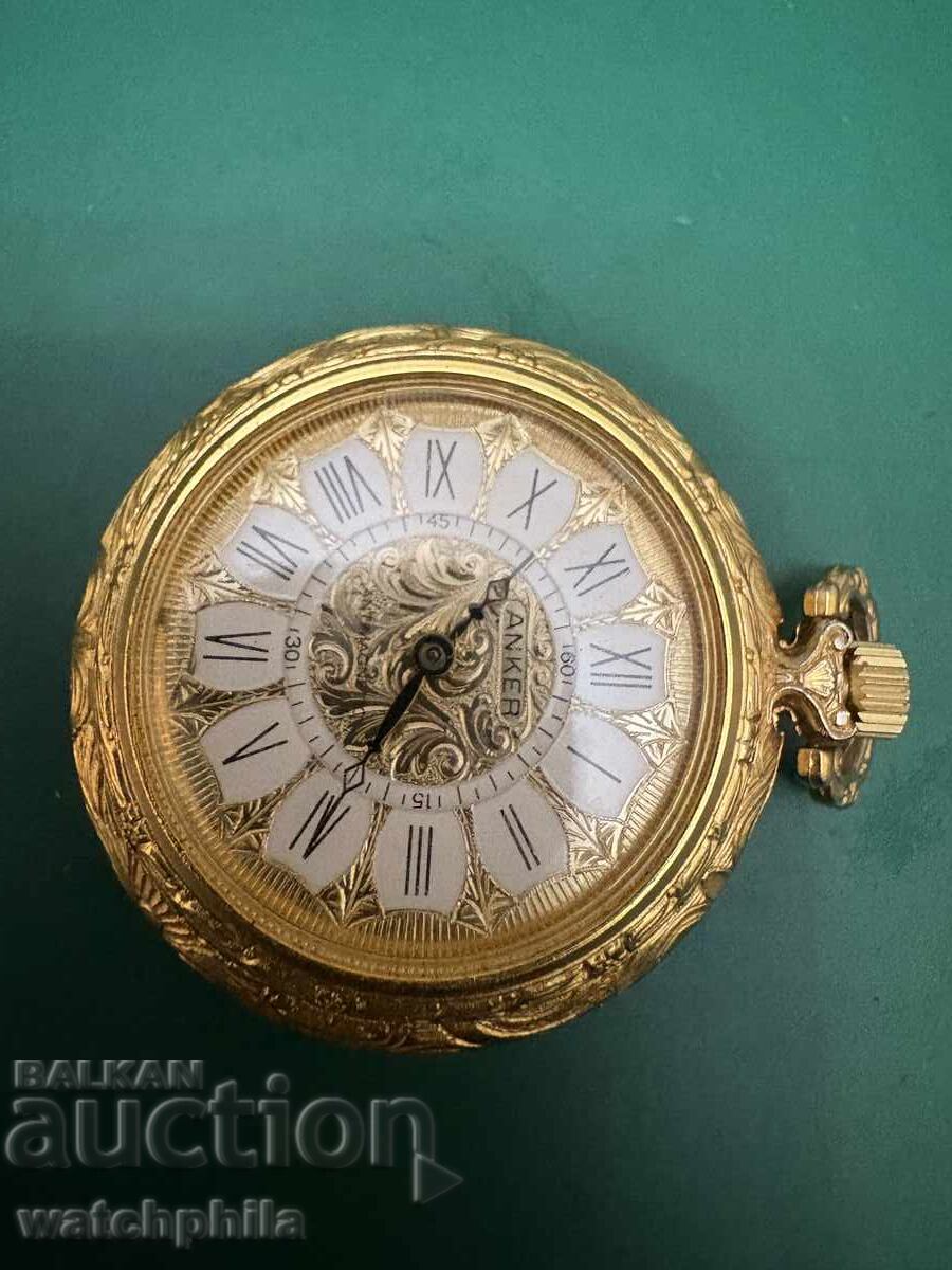 Auction  Rare Anker pocket watch, medallion type. Porcelain/Gold plated