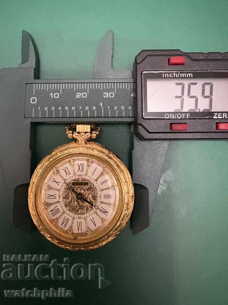 Delivery of Rare Anker pocket watch, medallion type. Porcelain/Gold plated