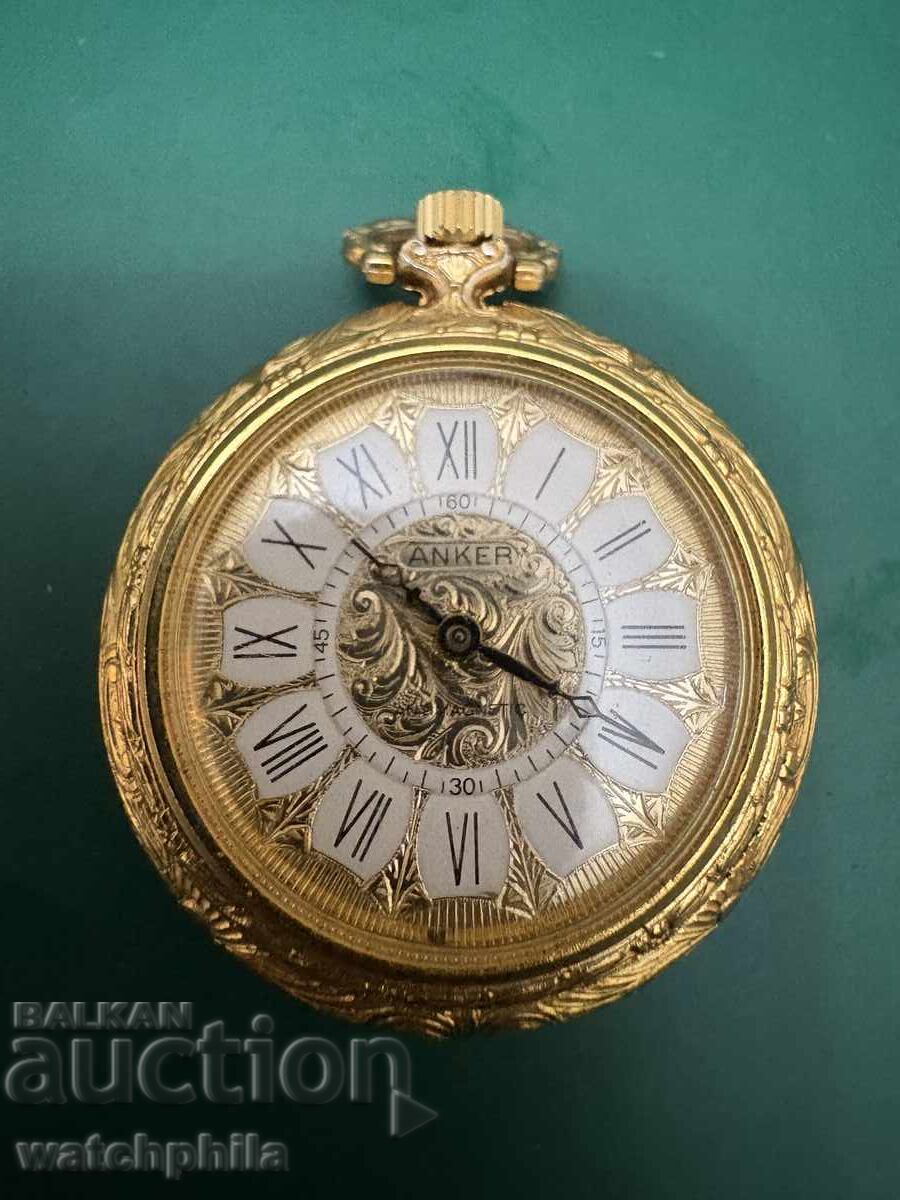 Rare Anker pocket watch, medallion type. Porcelain/Gold plated