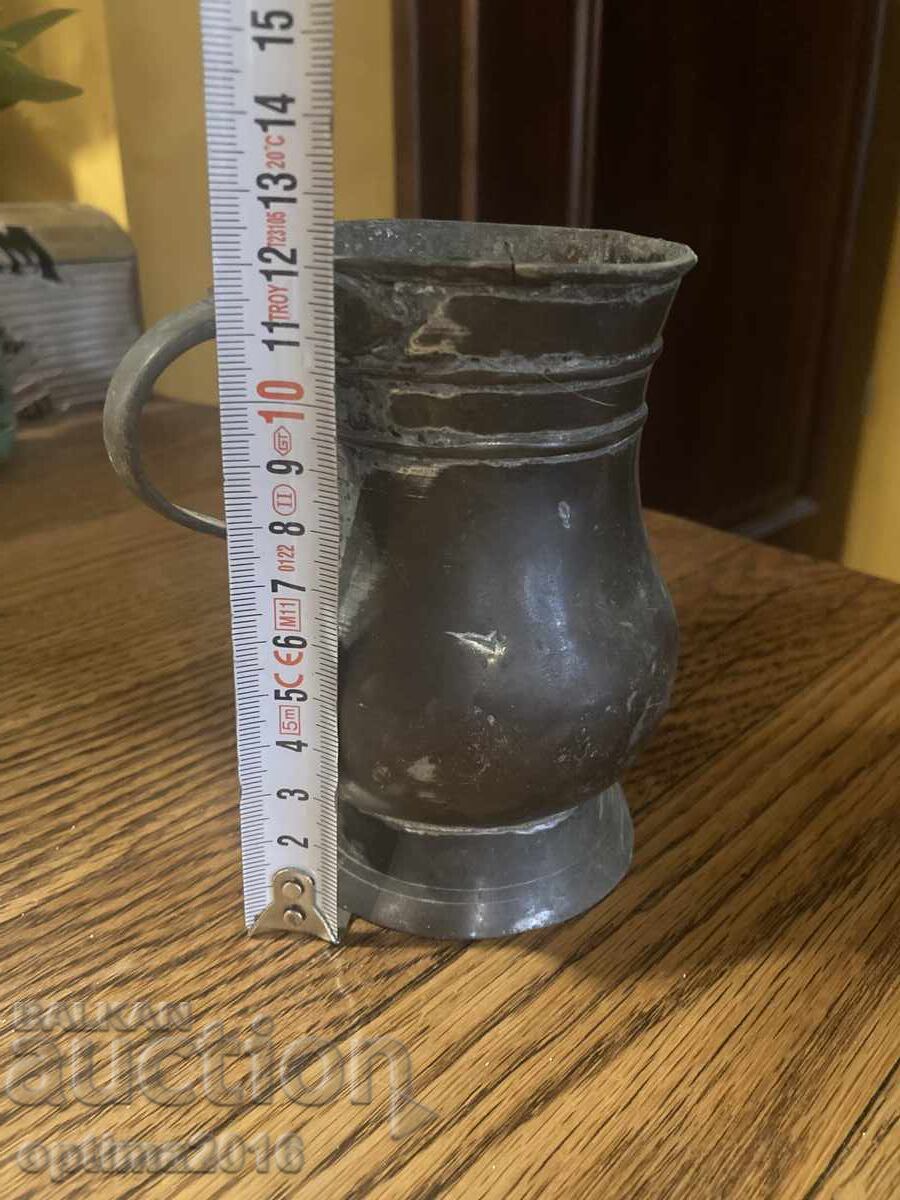 Livrarea Căniță din alamă