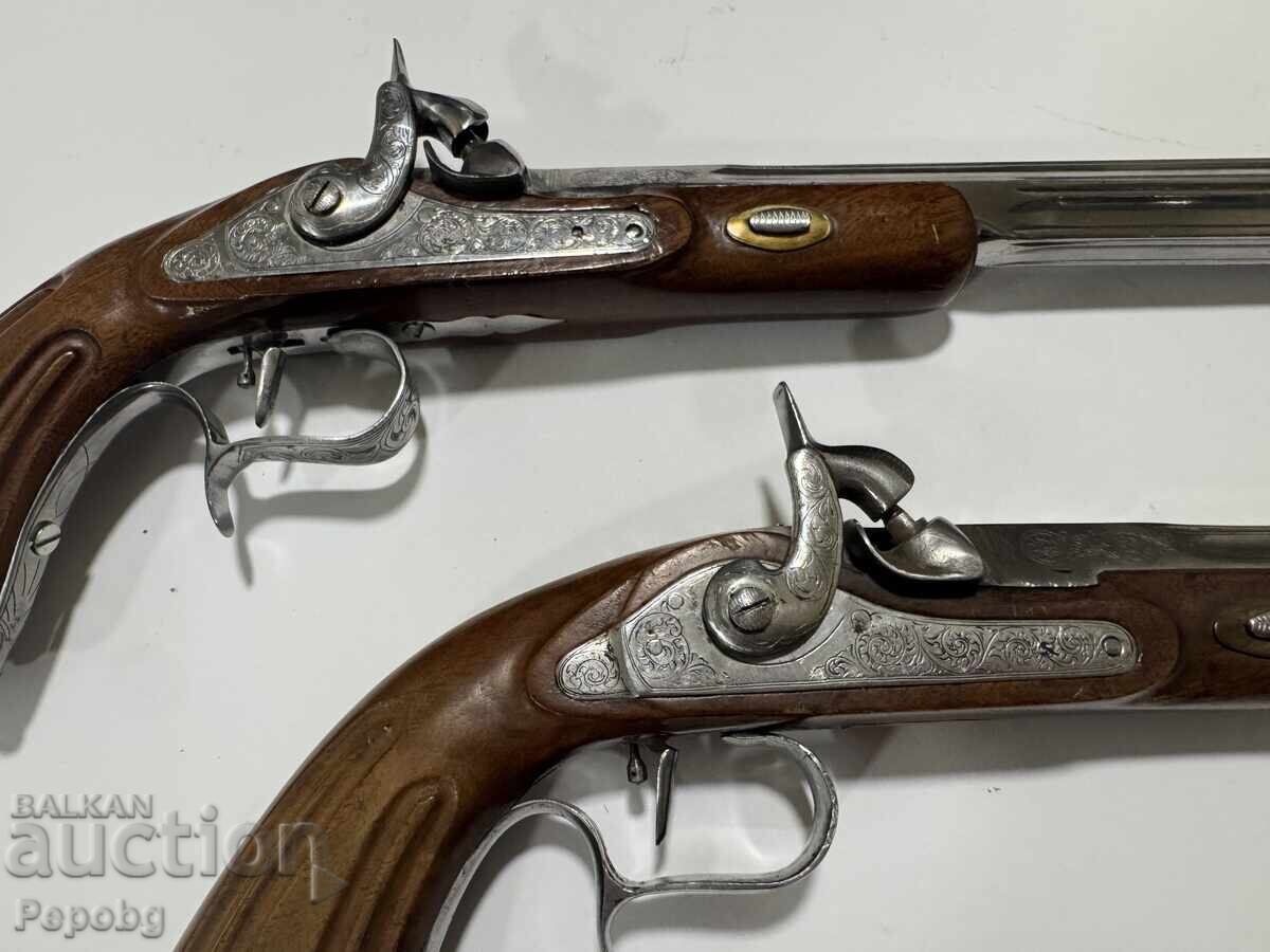 Delivery of Pair of capsule pistols