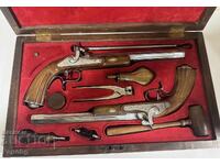 Δύο πιστόλια κάψουλας