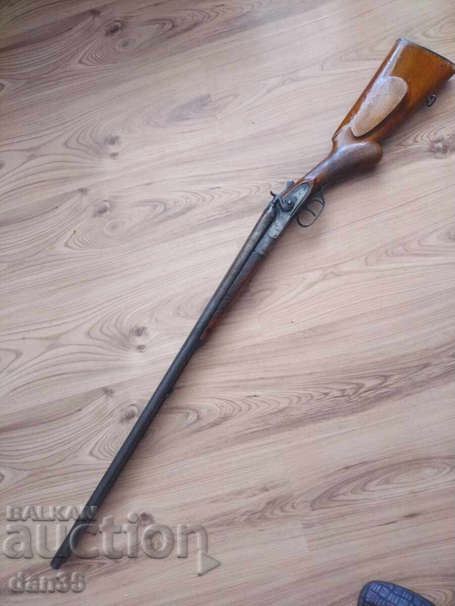 OLD DOUBLE-BARRELED SHOTGUN 16 GAUGE OLD DOUBLE-BARRELED SHOTGUN 16 GAUGE