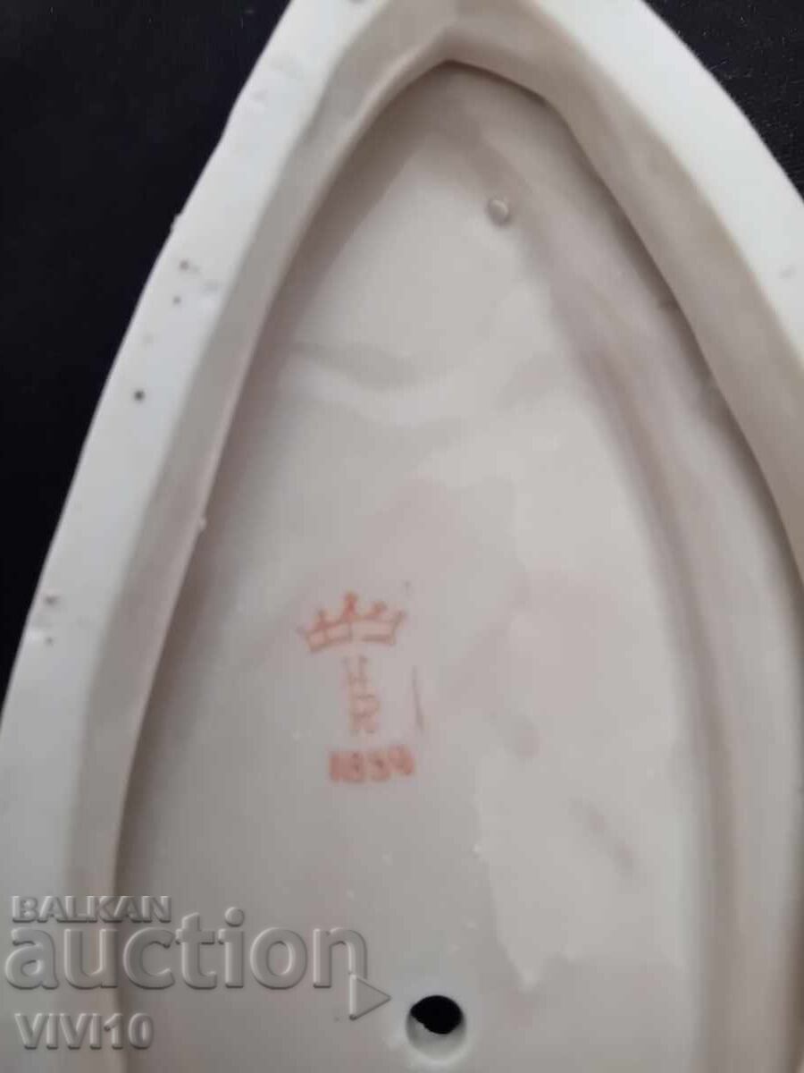 Auction  Antique porcelain figure, marked