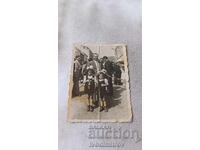 Photo Sofia Man and two little girls on the street